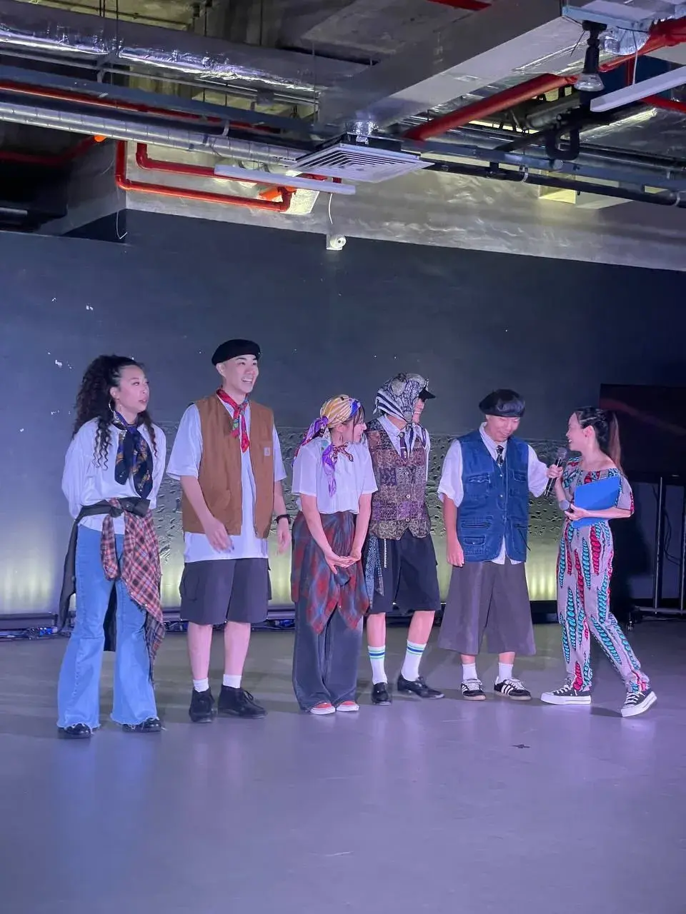 A crew performing on stage at the ACE 2025 Showcase